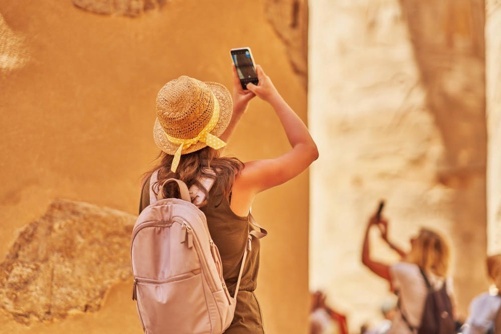 Turista tirando foto